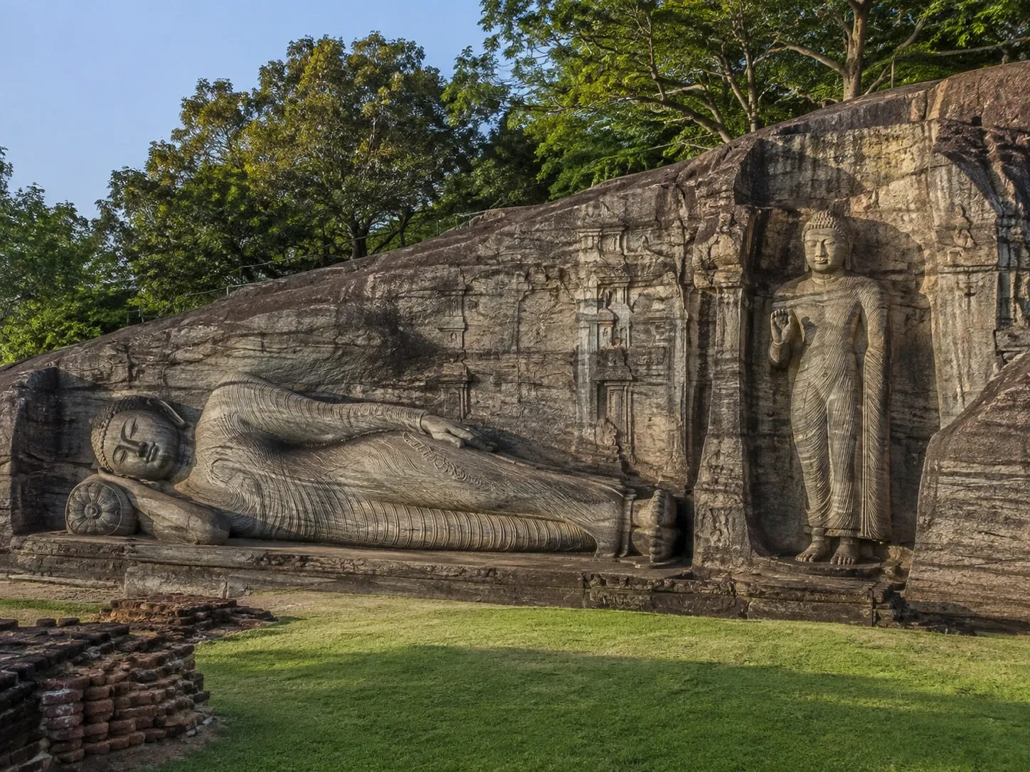 The Gal Vihara reclining and standing Buddha statues carved into granite at Polonnaruwa, Sri Lanka